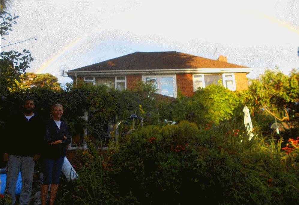 Raj Bansal, June Lovelock, a rainbow, and flat roof, in Sunninghill